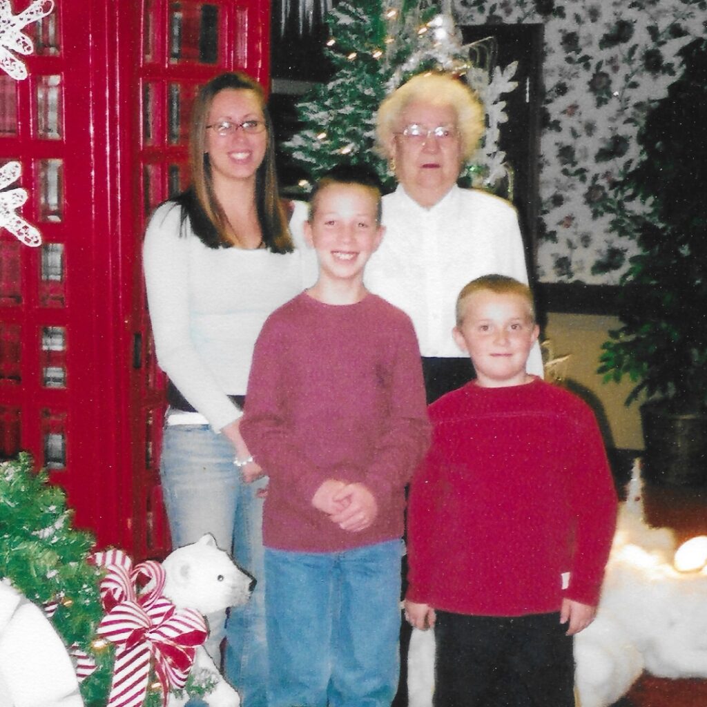 Gertrude Kraft, the mother of Bob Kraft, stands with her grandchildren in this family photo. 