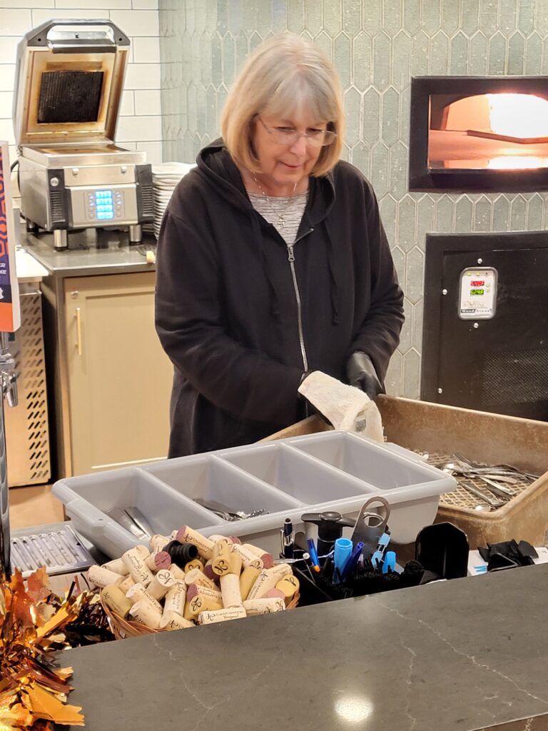 Brenda Lausch volunteering with Hearth and Harrow